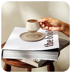 Cup under book
